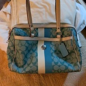 Coach purse, beautiful light blue and cream color outside, light gold inside.